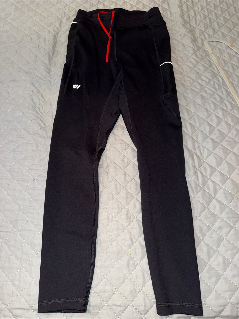 Wolaco women’s Black Performance marathon tights with Red Drawstring medium